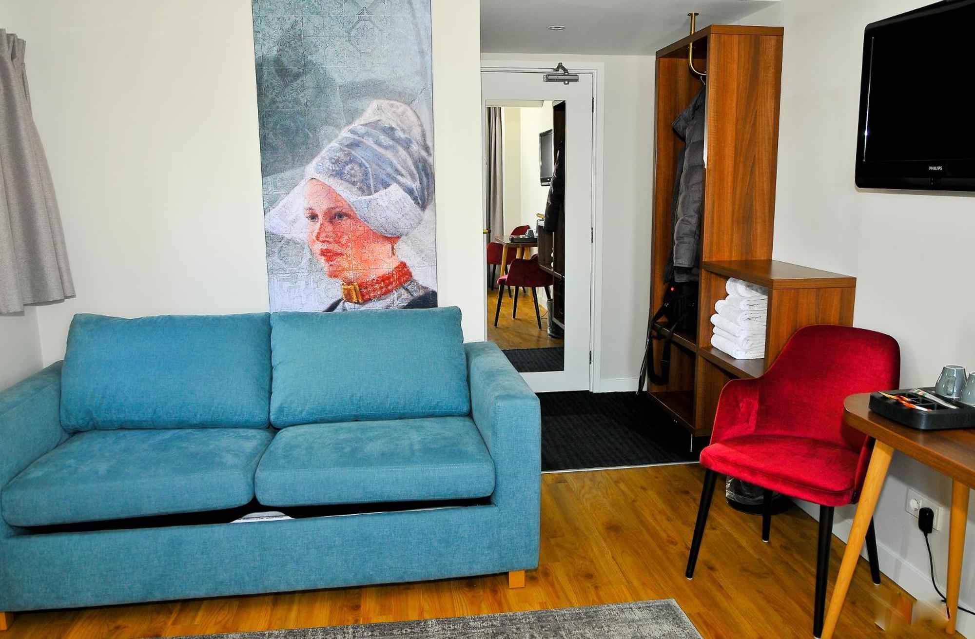 Suite with Two Single Beds and Sofa Bed