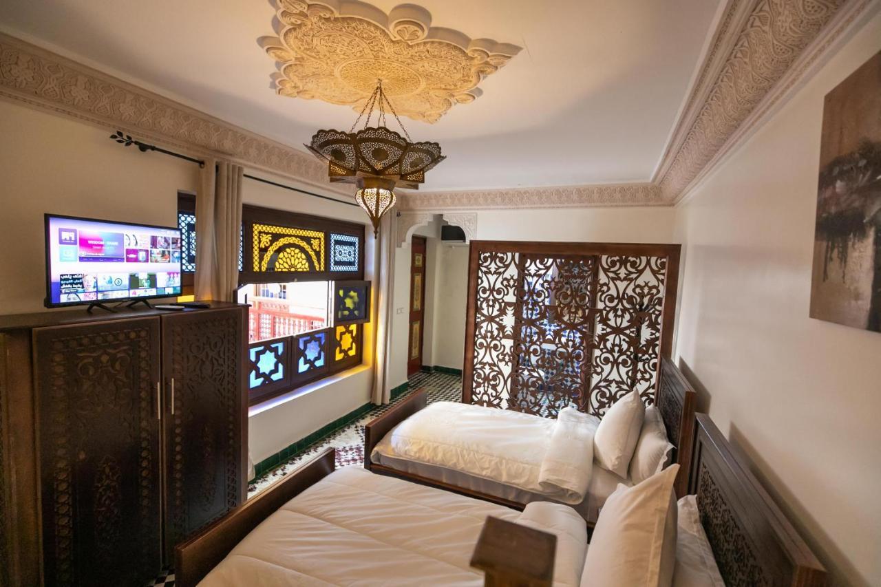Chambre Quadruple avec Salle de Bains Privative