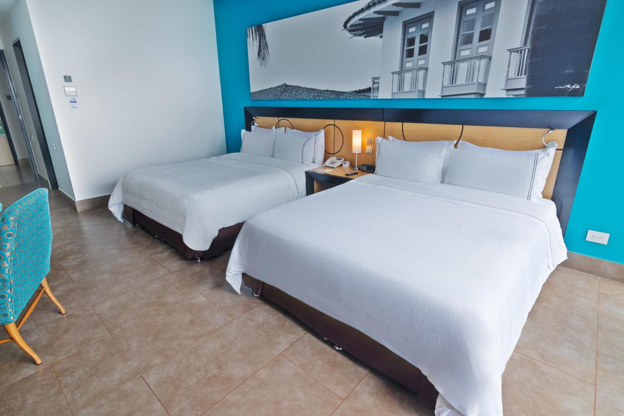 Quarto com 2 Camas de Solteiro (2 Adultos)