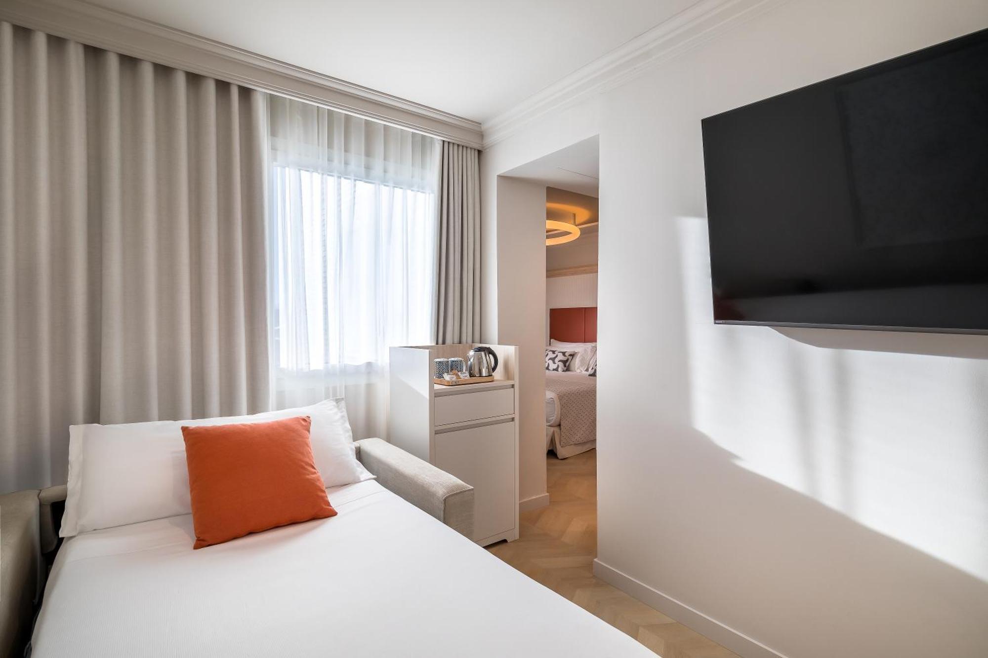 Chambre Triple (2 Adultes + 1 Enfant)