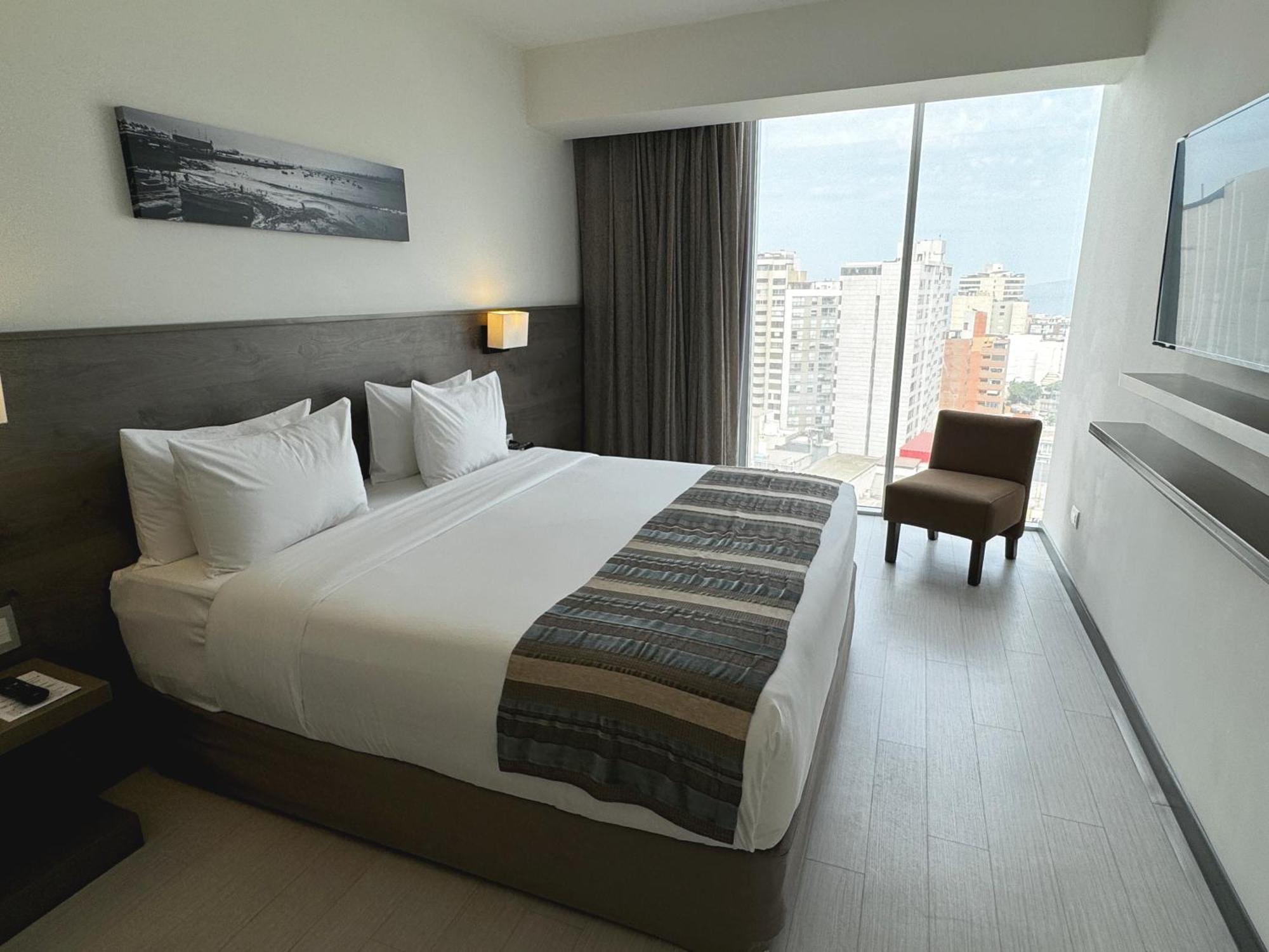 Junior King Suite with Partial Ocean View,1611172226:JPEG