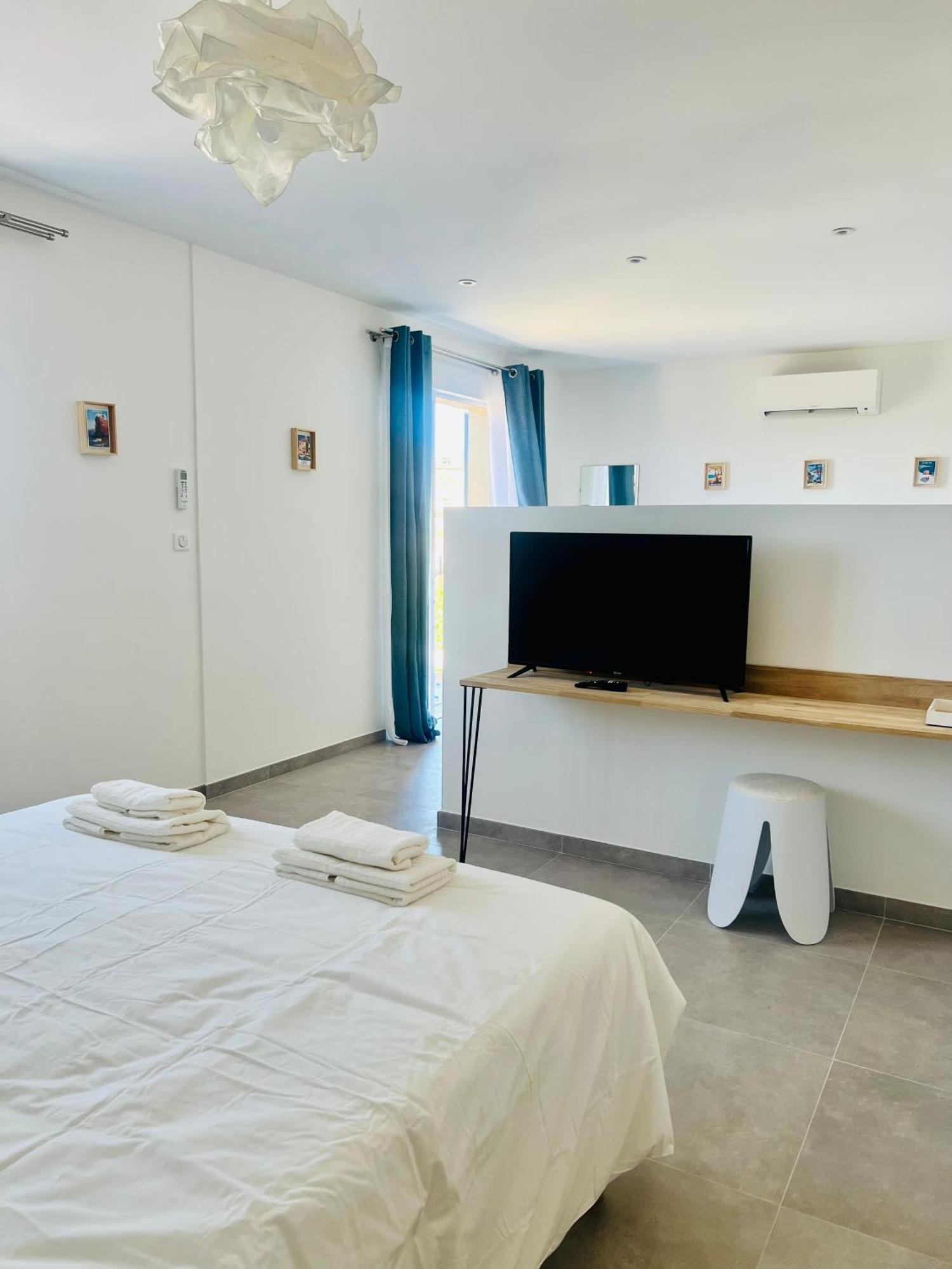 Chambre Quadruple avec Salle de Bains Privative