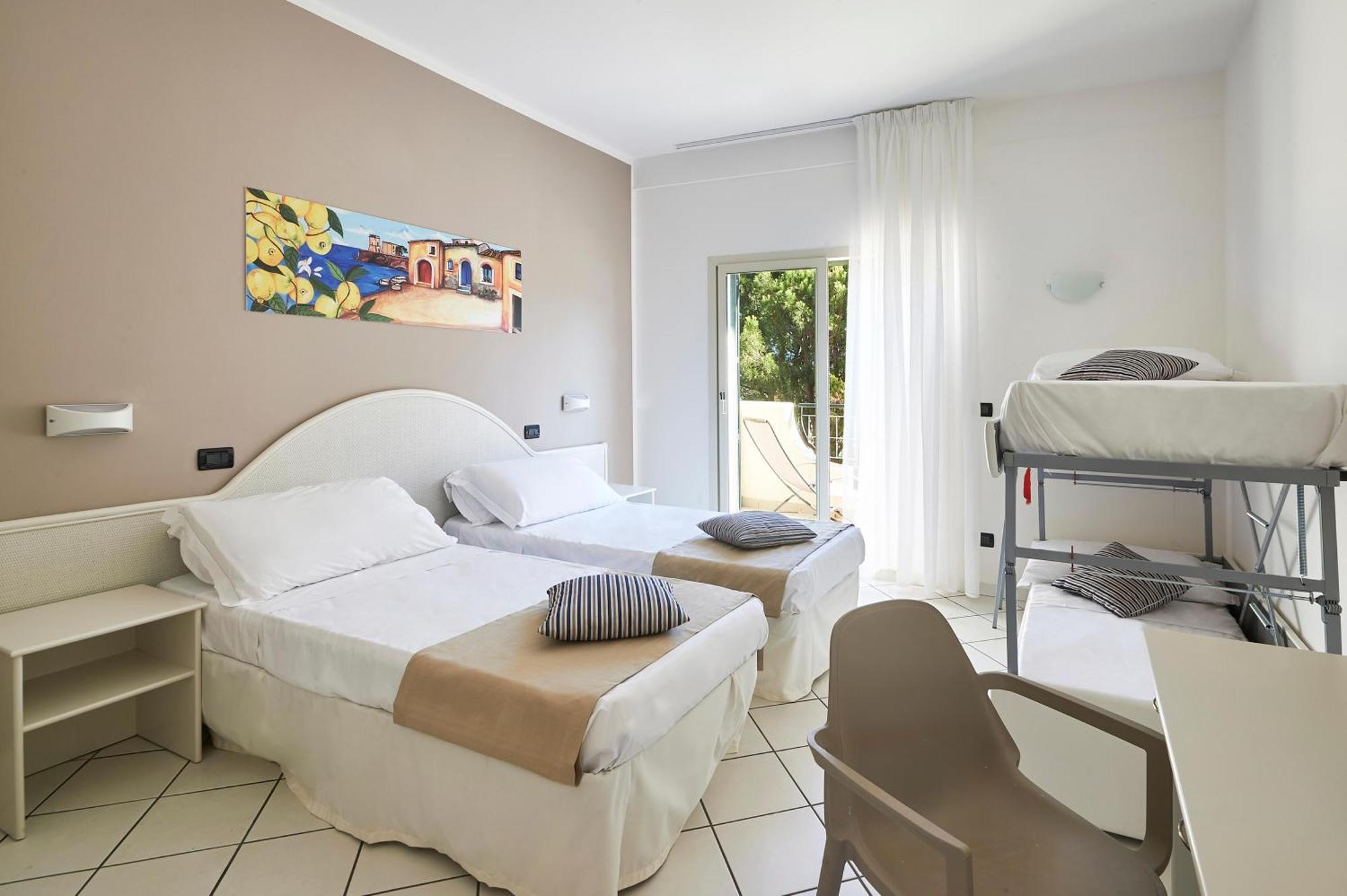 Camera Quadrupla Comfort con Vista Giardino