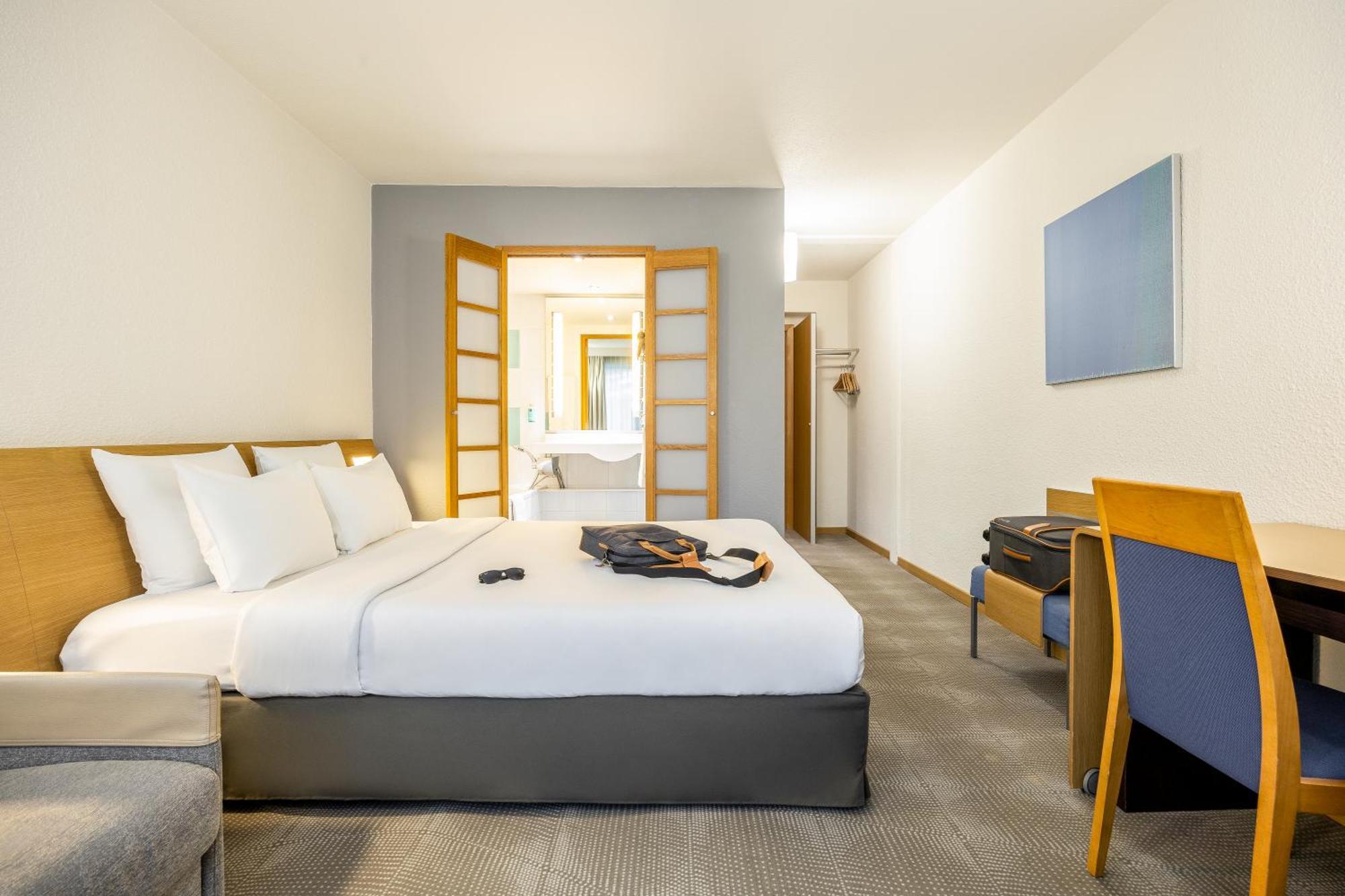 Superior Kamer met 1 tweepersoonsbed en een bank