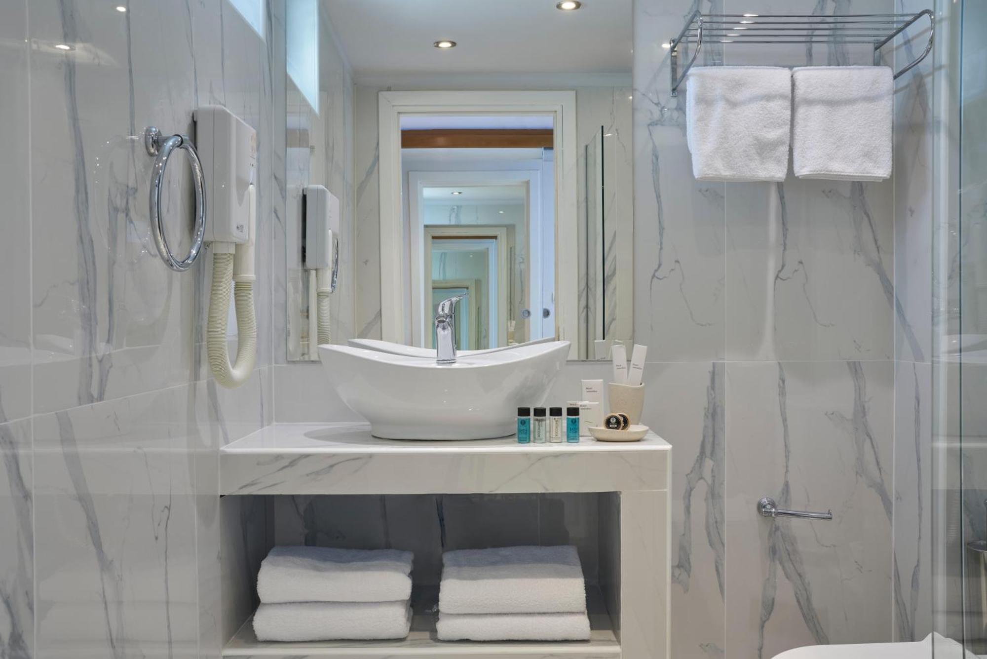Junior Suite with Sea and Poros Town View