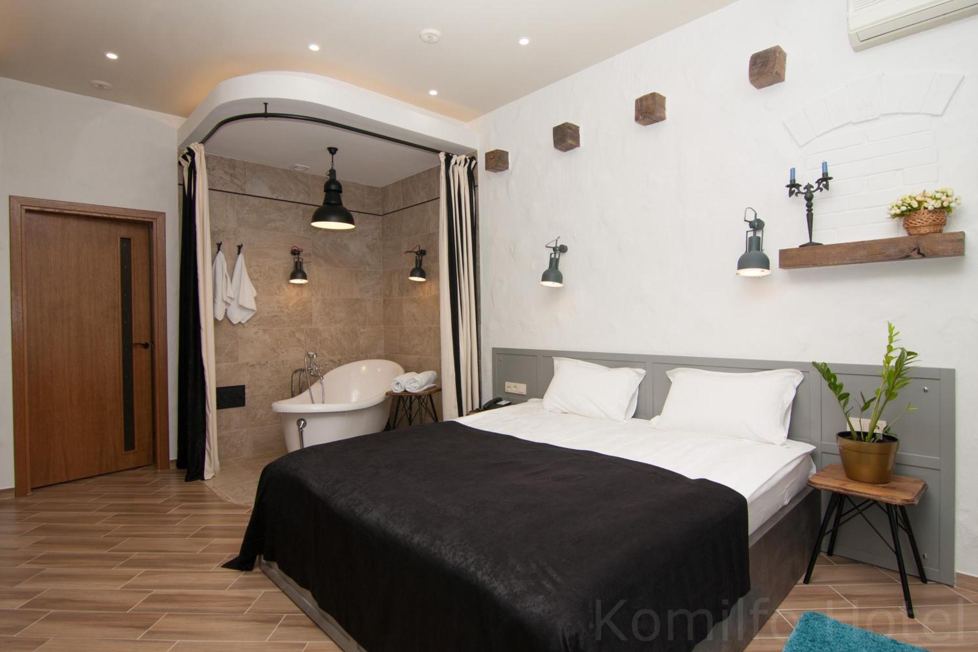 Suite mit Kingsize-Bett und Balkon