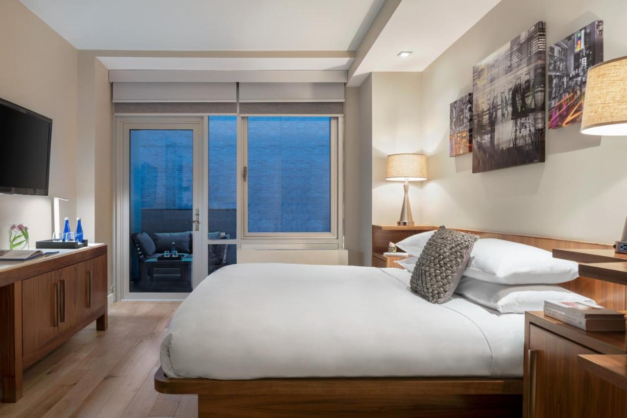 Habitación Grand Balcony con cama extragrande y balcón