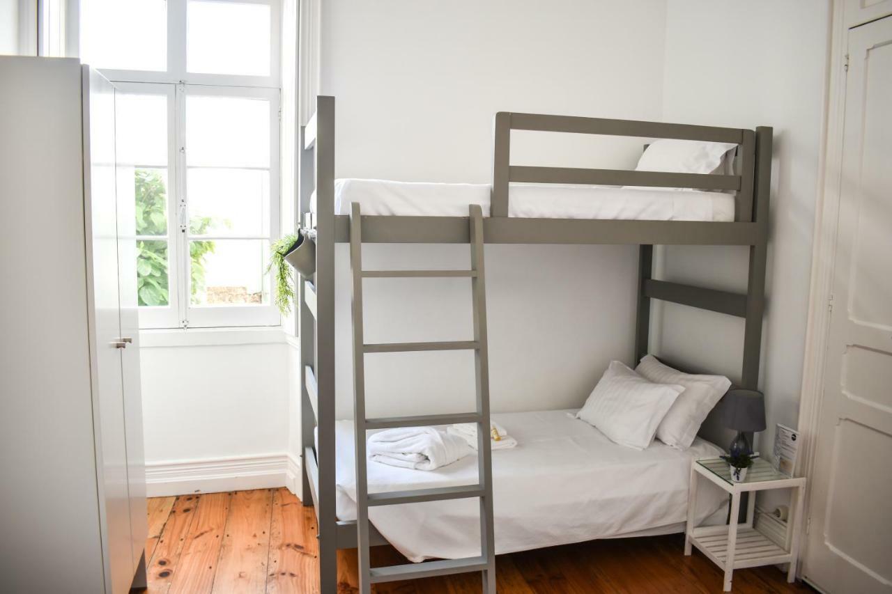 Quarto Triplo com Casa de Banho Partilhada